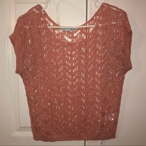 Unique pink knit top.